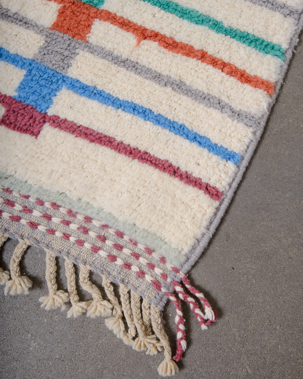 Modern, designer, handcrafted Berber rug from Morocco. Beniourain carpet with beautiful colours and patterns and fluffy wool texture.